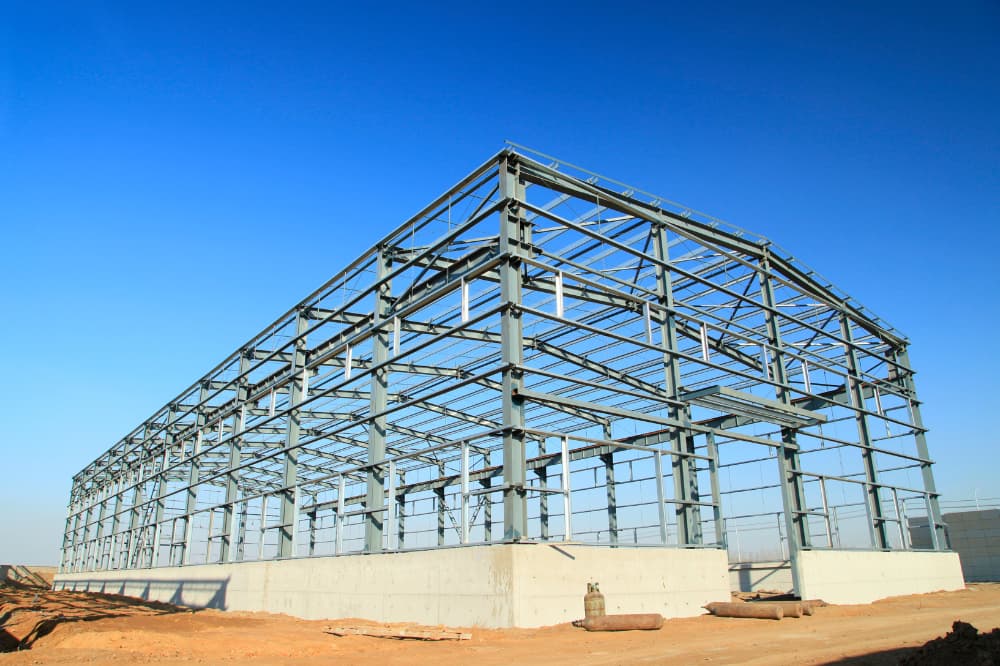 large steel frame building halfway through the construction process